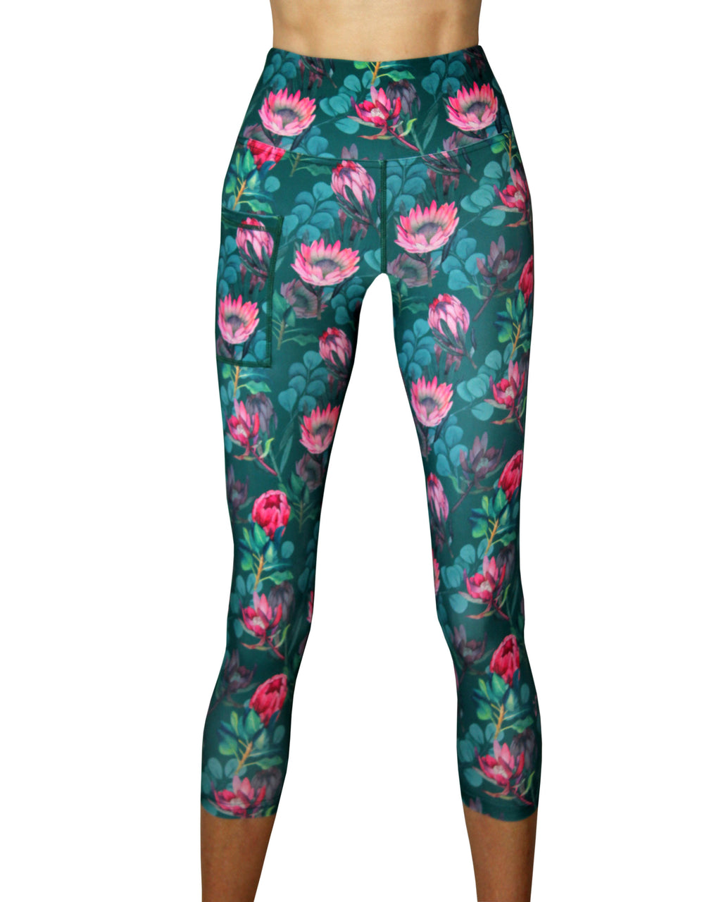 Vivolicious three quarter leggings with a beautiful protea design.  Made in Cape Town, South Africa.  These leggings have a high waistband, a cellphone pocket, a double lined gusset and an inside waist tie.  Perfect for running, gym workouts, and wearing as a yoga outfit.