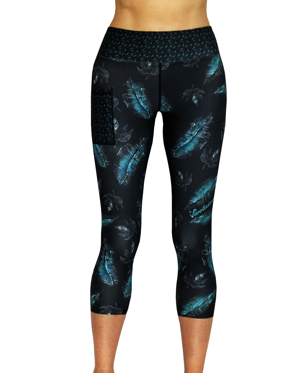 Black yoga leggings with blue feather pattern.  